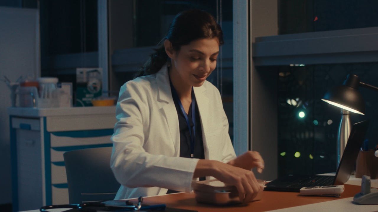 Doctor at her desk at night